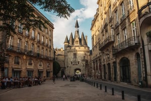 An image of a gothic city gate leading into the old city of Bordeaux in France